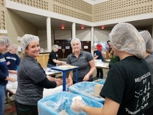 Volunteers work at Feed My Starving Children Oct. 3, 2018.
