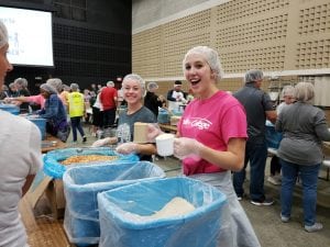Students work at Feed My Starving Children Oct. 3, 2018.