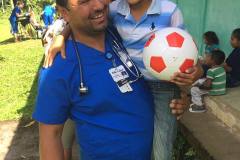 village daniel with soccer child
