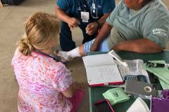 village lady with knife